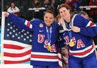 Cayla Barnes and Kelly Pannek of Team USA celebrate after the medal ceremony following the Women's Gold Medal match between the United States and Canada.