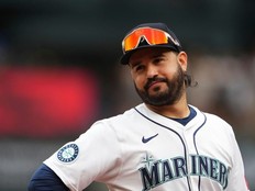 Seattle Mariners third baseman Eugenio Suarez looks on during a baseball game against the San Diego Padres, Aug. 27, 2025, in Seattle.