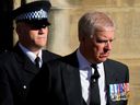 The former Prince Andrew is seen leaving St. Giles Cathedral after the arrival of the coffin containing the remains of his mother Queen Elizabeth, in Edinburgh, Scotland, Sept. 12, 2022.