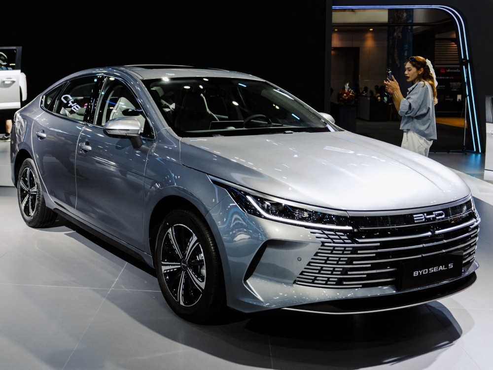 CHINA'S EV PLOT THREATENS US-CANADA TRADE WAR!