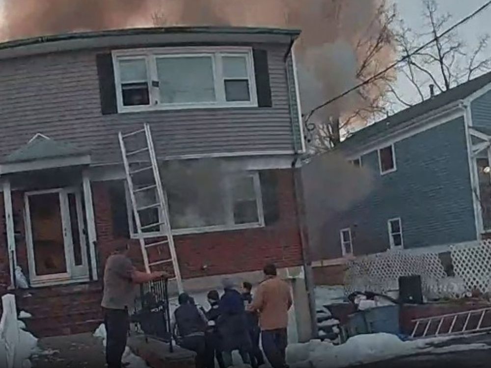 Body cam video shows dramatic rescue of family from burning New York state home