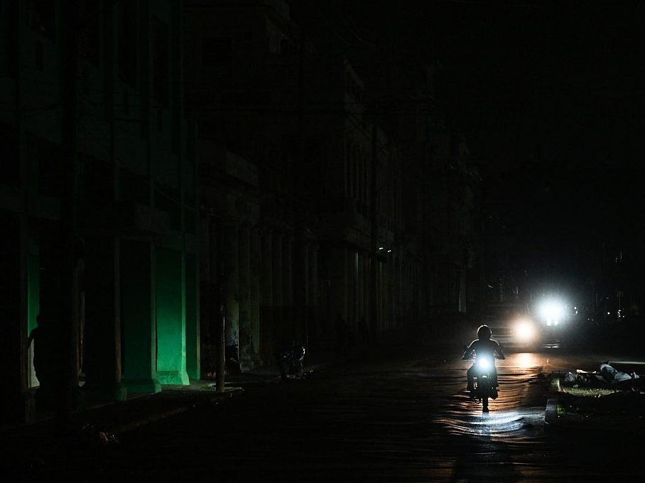  A motorcyclist rides on a street during a blackout in Havana on January 25, 2026. (Yamil Lage/AFP/Getty Images)