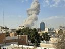 A plume of smoke rises after an explosion in Tehran, Iran, Saturday, Feb. 28, 2026. After explosions were seen in the Iranian capital, the office of the Israeli Defense Minister issued a statement saying it had launched a preemptive strike against the country.