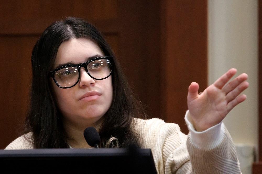  Juliana Peres Magalhaes testifies during the double murder trial for Brendan Banfield in Fairfax County Circuit Court, in January in Fairfax, Va. (Tom Brenner/The Associated Press)