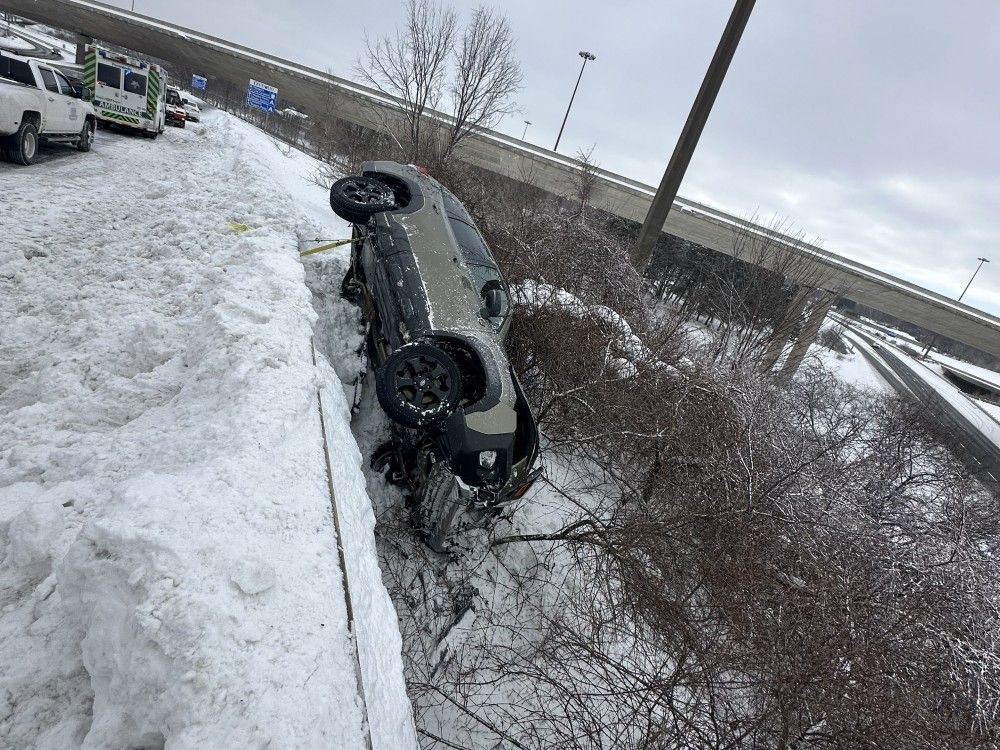 Ontario Provincial Police said a female driver in Niagara Falls last week lost control of her vehicle on a highway ramp where it mounted a snow-covered concrete barrier before coming to a rest on an embankment.