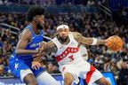 Toronto Raptors forward Brandon Ingram (3) makes a move against Orlando Magic forward Jonathan Isaac, left, during the second half of an NBA basketball game, Friday, Jan. 30, 2026, in Orlando, Fla. (AP Photo/John Raoux)