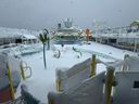 The deck of Royal Caribbeans Odyssey of the Seas is covered in snow.