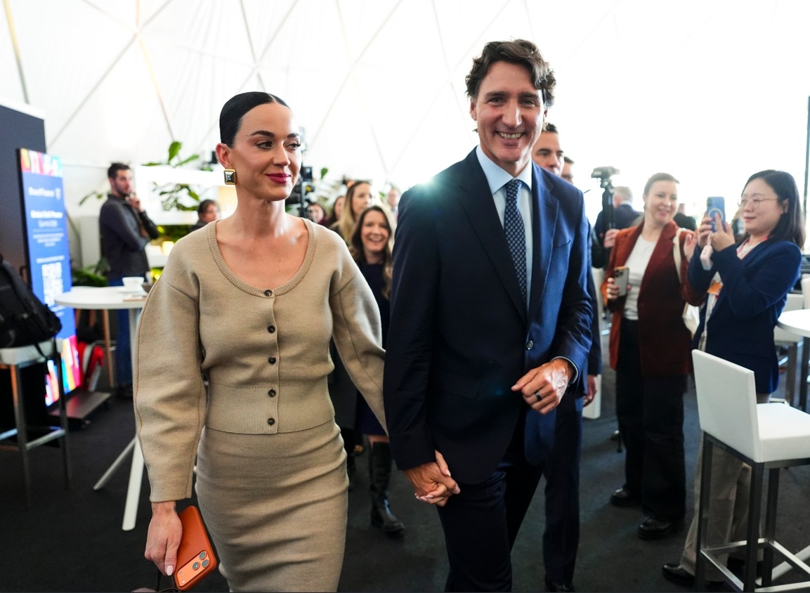  Former Canadian prime minister Justin Trudeau holds hands with Katy Perry as they leave an event during the World Economic Forum in Davos, Switzerland on Tuesday, Jan. 20, 2026.