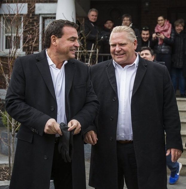  Ontario PC Leader Doug Ford (right) and Coun. Giorgio Mammoliti before the start of the St. Francis of Assisi Church Toronto Good Friday Procession in the Little Italy area in Toronto, Ont. on Friday March 30, 2018.