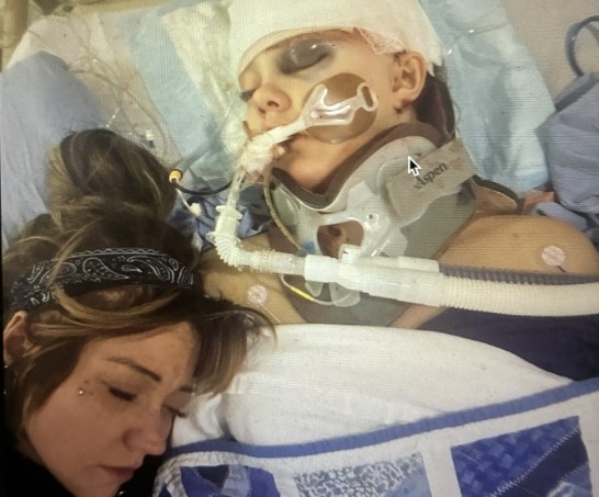  Cia Edmonds bedside with her 12-year-old girl Maya in hospital. FACEBOOK