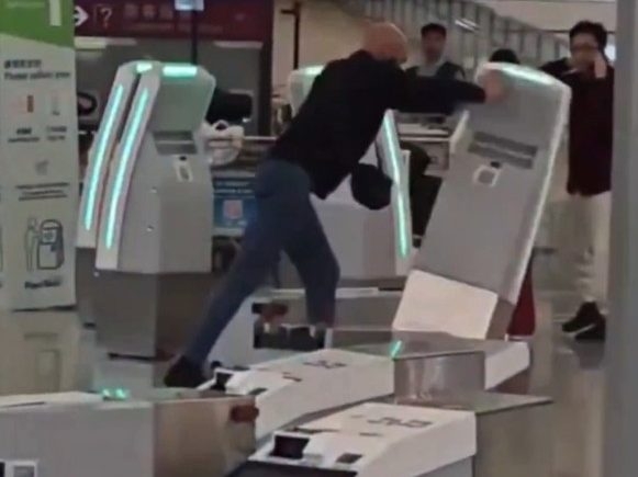 HONG KONG MELTDOWN: Tourist's Airport RAGE Caught on Camera!