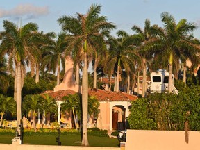 In this file photo, a mobile police tower can be seen on the grounds of U.S. President Donald Trump's South Florida home in Mar-a-Lago in Palm Beach, Fla., on Dec. 20, 2024.