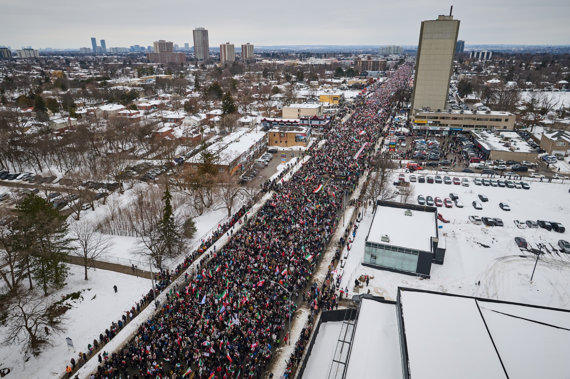  Protesters march for regime change in Iran during a demonstration in Toronto on Saturday, Feb. 14, 2026.