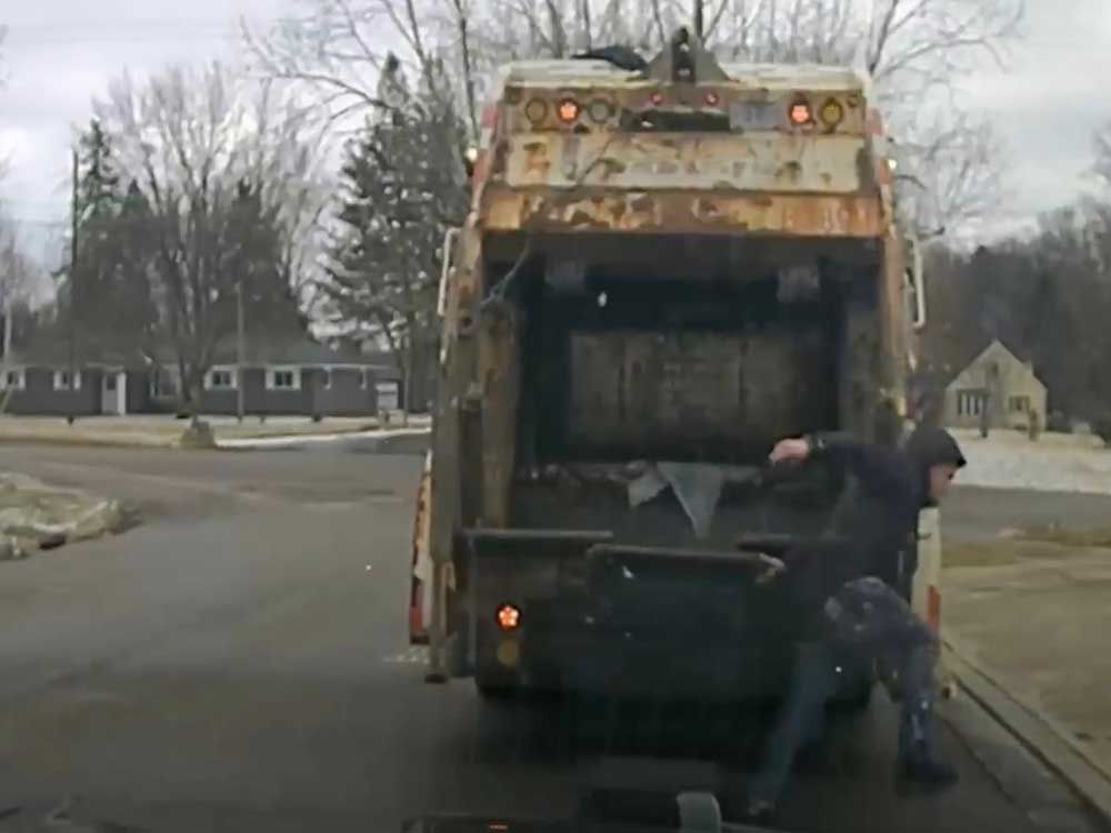Ohio sanitation worker finds suspect hiding from police in trash can