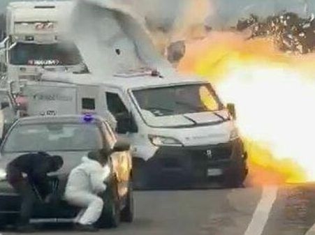 Dramatic video shows masked gang blowing up armoured truck in brazen heist