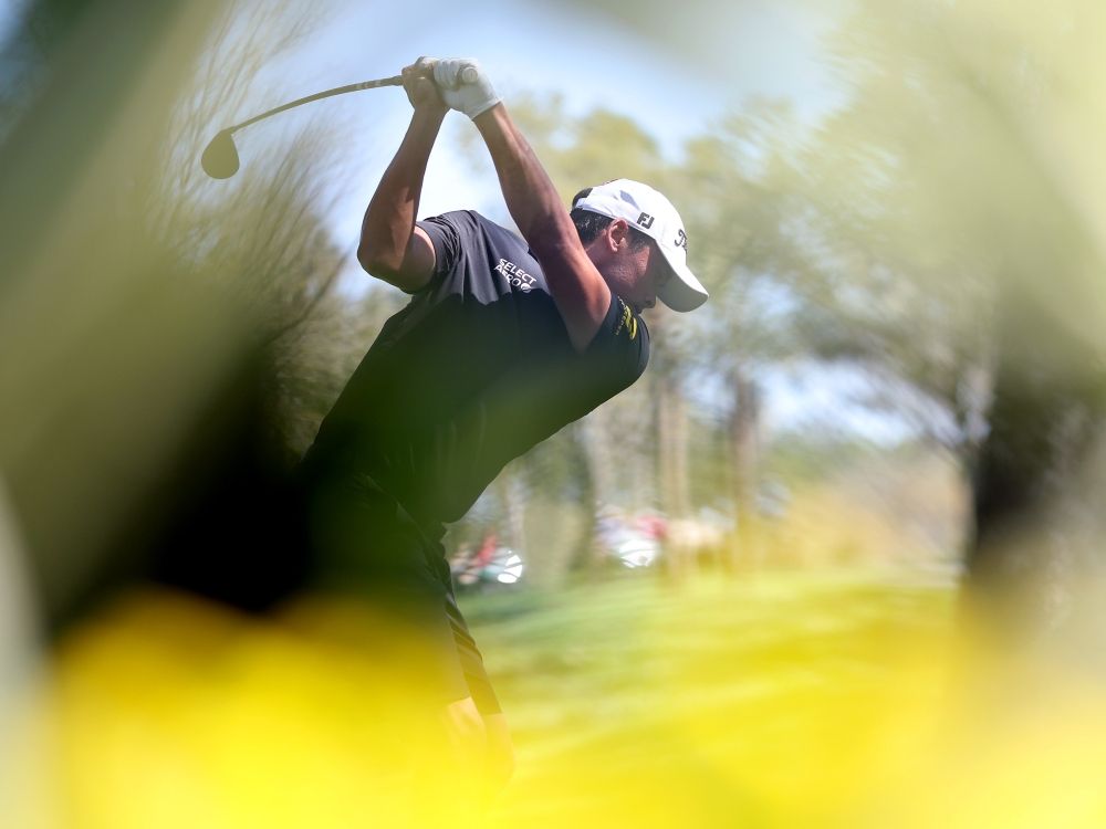 A.J. Ewart of Canada plays a shot prior to THE PLAYERS Championship 2026.