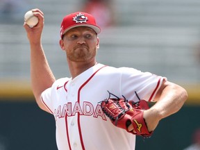 Mike Soroka of Canada pitches