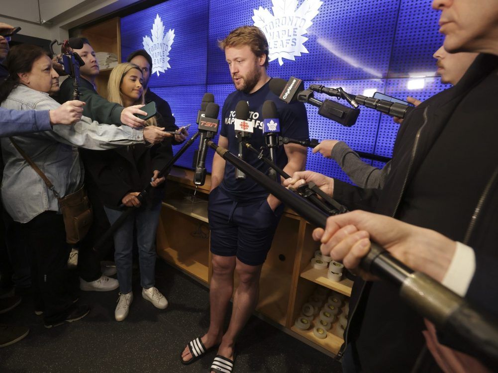 Morgan Rielly speaks to the media