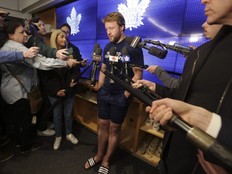 Morgan Rielly speaks to the media