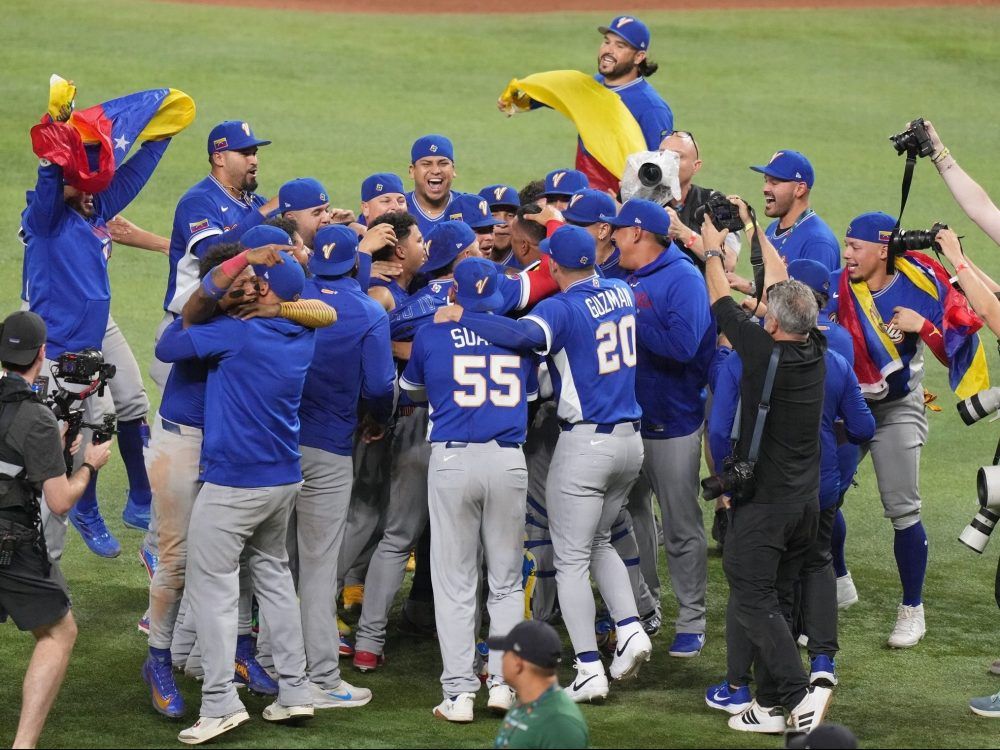 Venezuela players celebrate after winning the WBC