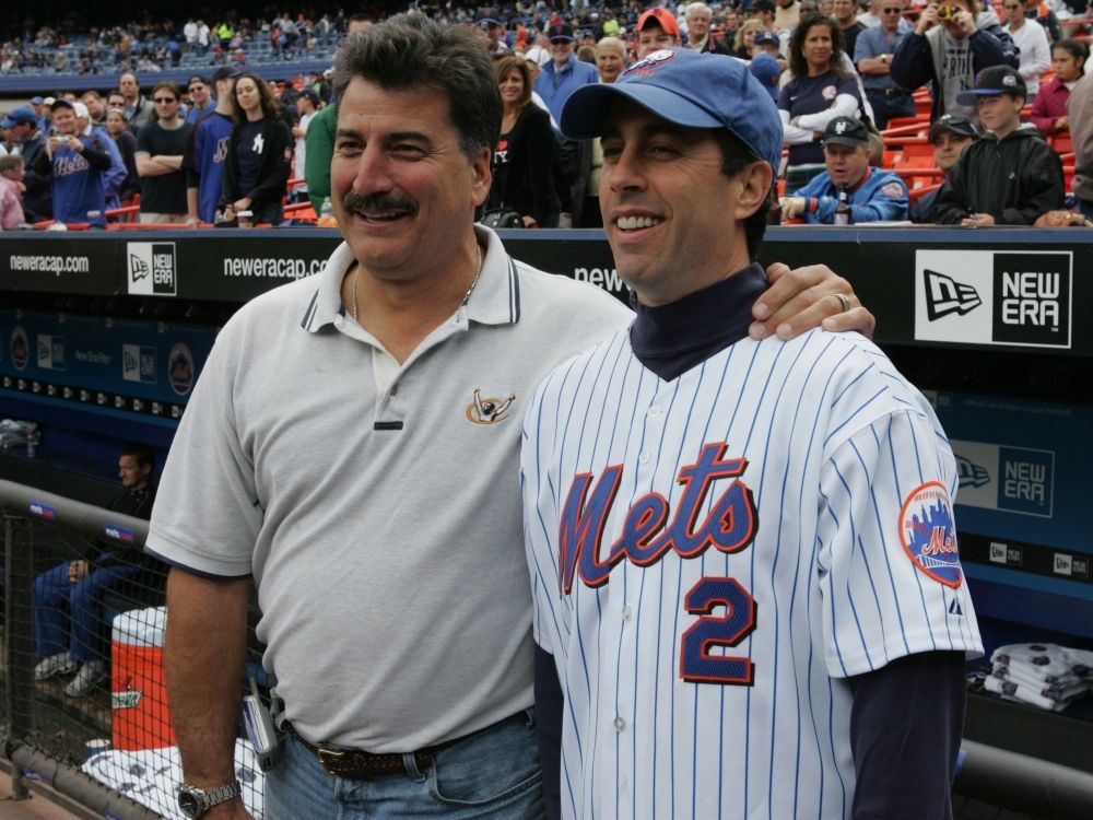 Former player Keith Hernandez (left) poses for a picture with comedian Jerry Seinfeld before the game between the New York Mets and Yankees at Shea Stadium on May 22, 2005. 