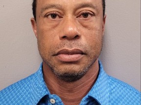 In this handout photo provided by the Martin County Sheriff's Office, Tiger Woods poses for his booking photo after his arrest on March 27, 2026 in Stuart, Florida.
