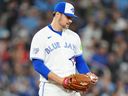Toronto Blue Jays pitcher Brendon Little reacts after giving up a grand slam against the Athletics.