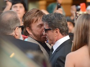 Actors Chuck Norris and Sylvester Stallone arrive at Lionsgate Films' 'The Expendables 2' premiere on August 15, 2012 in Hollywood, California.