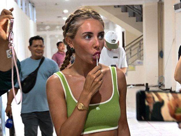 British adult content creator Tia Billinger, known as 'Bonnie Blue', arrives at Ngurah Rai Immigration Office in Jimbaran on Indonesia's resort island of Bali on December 11, 2025.