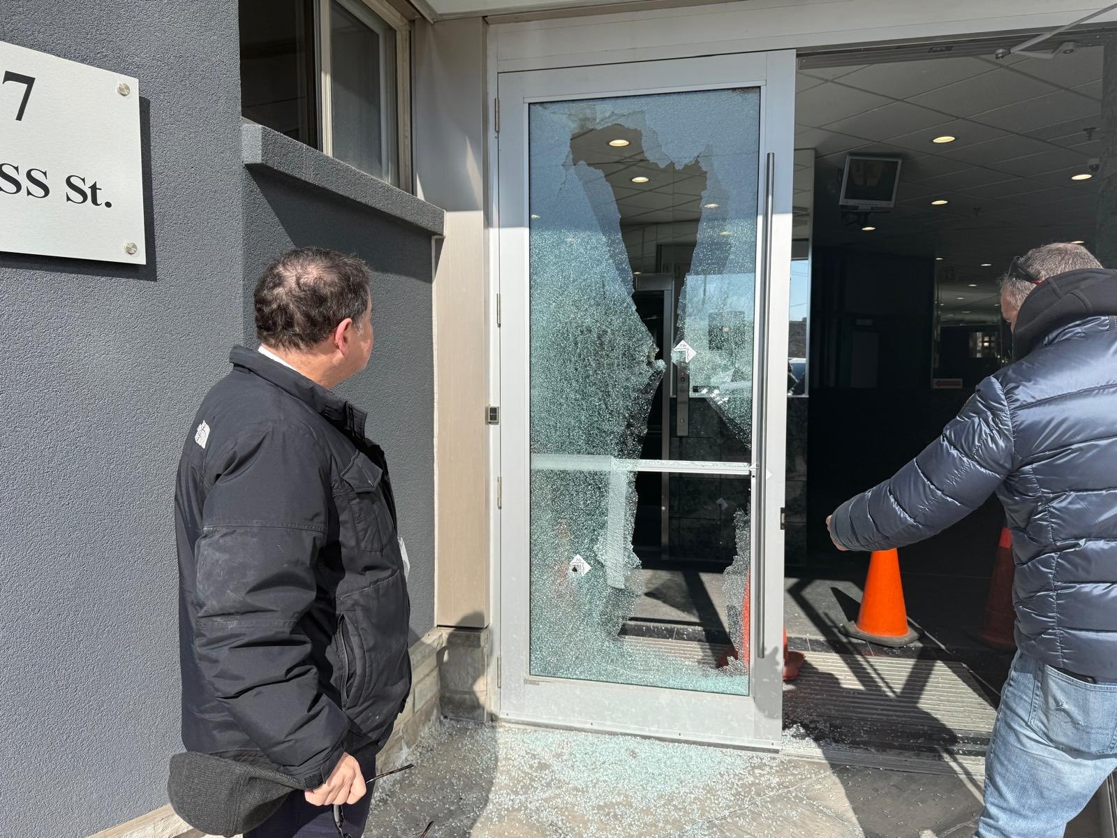  Councillor James Pasternak surveys a Dufferin St. and Steeles Ave. business in his ward that was shot up.