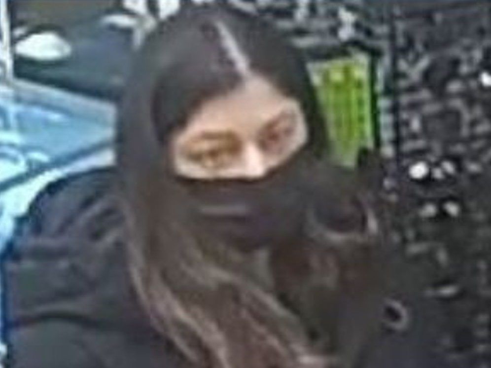 This unidentified woman is sought as a suspected in a distraction theft that occurred in Hamilton on Feb. 11, 2026.