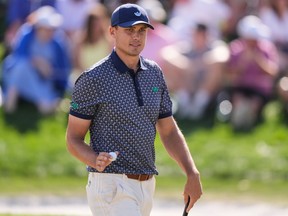 Ludvig Aberg of Sweden reacts after a birdie on the ninth green during the third round of The Players Championship in Ponte Vedra Beach, Fla., Saturday, March 14, 2026.