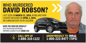 Homicide victim David Robson on a billboard.