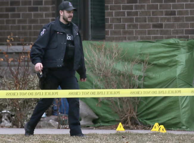 LaSalle Police at the crime scene. POSTMEDIA