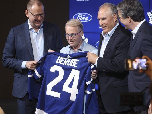 From left, Maple Leafs general manager Brad Treliving, CEO Keith Pelley, coach Craig Berube and president Brendan Shanahan announce the hiring of Berube on May 21, 2024.