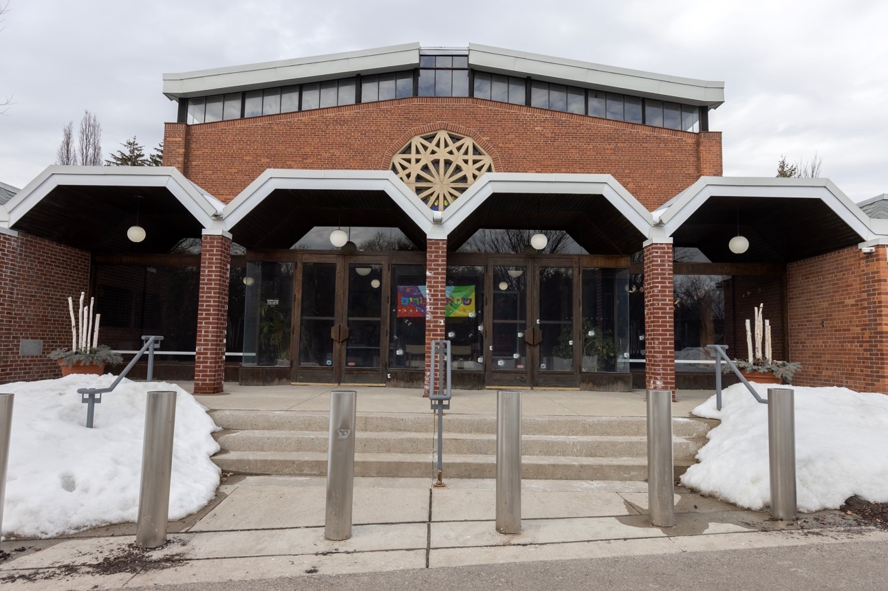  Bullet holes mark the front doors and windows after Jewish Temple Emanu-El in Toronto was shot up on Tuesday, March 3, 2026.