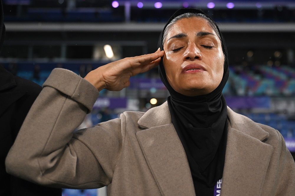 Iran coach Marziyeh Jafari salutes during the national anthem ahead of the Women’s Asian Cup soccer match between Iran and the Philippines in Robina, Australia, on March 8.