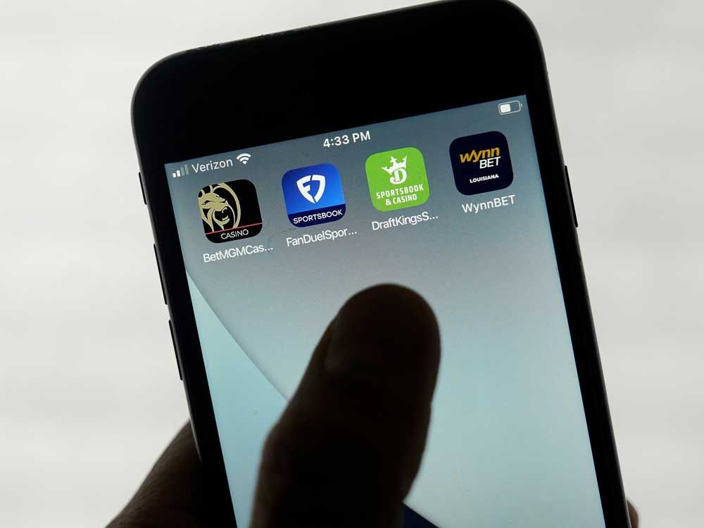 FanDuel, DraftKings and other online gambling apps are displayed on a phone in San Francisco, Sept. 26, 2022. 