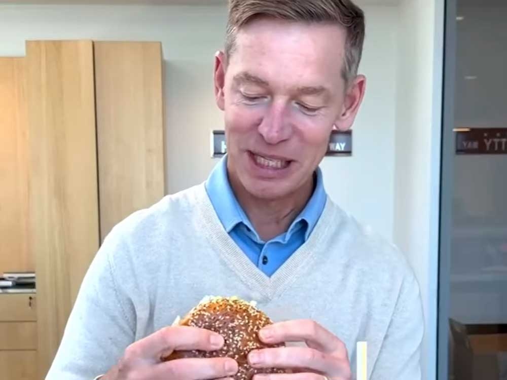  McDonald’s CEO and chairman, Chris Kempczinski, is pictured in a video introducing the fast-food chain’s newest Big Arch burger.