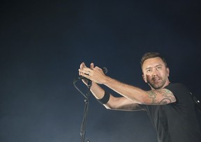 Lead singer Tim McIlrath from Chicago punk rock band Rise Against performs on the last day of Bluesfest in Ottawa on July 15, 2018.