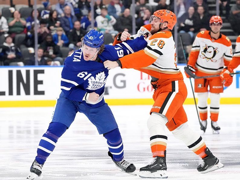 Maple Leafs Michael Pezzetta fights with Anaheim Ducks Jeffrey Viel during the first period  in Toronto on Thursday, March 12, 2026.