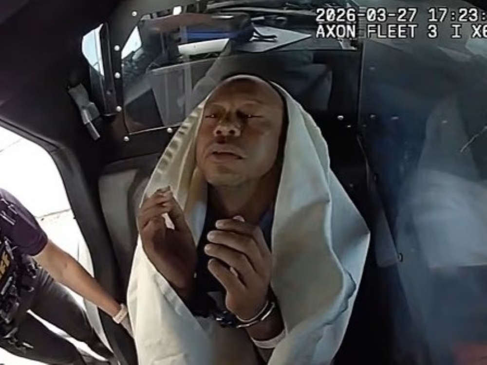 Tiger Woods after being put in the back of a police vehicle.