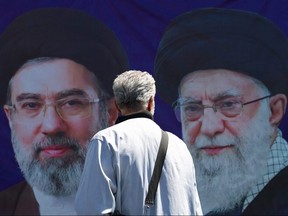 A banner with pictures of Iran's supreme leaders
