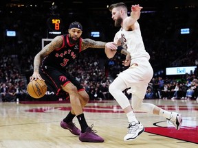 Brandon Ingram of the Toronto Raptors protects the ball
