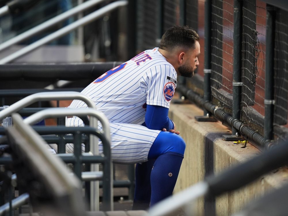 New York Mets' Bo Bichette sits in the dugout after the second baseball game of a doubleheader against the Colorado Rockies on April 26.