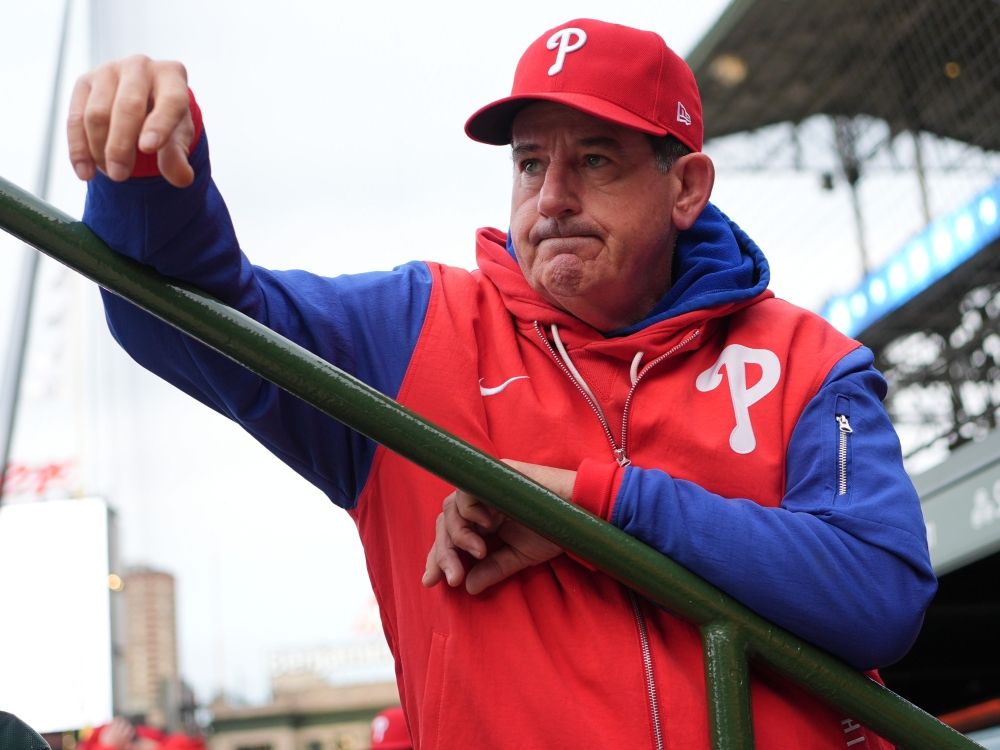 Philadelphia Phillies manager Rob Thomson looks to the field before a baseball game against the Chicago Cubs earlier this season.