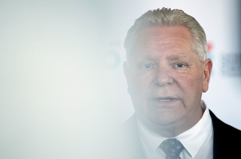 Ontario Premier Doug Ford speaks with reporters before attending an event in Ottawa, Monday, April 20, 2026. 