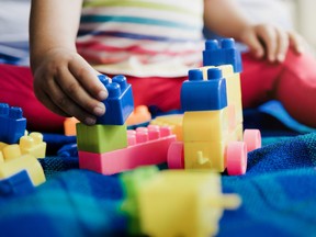 Kindergarten, Child playing with brick toys at daycare nursery. Education development games for school toddlers kids