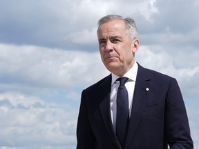Mark Carney set against the sky