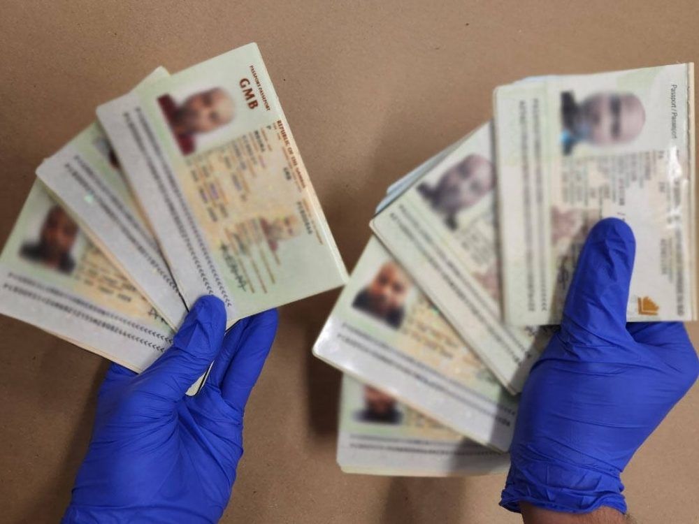 The RCMP says border agents uncovered fake passports at Pearson Airport and charged a Caledon woman.